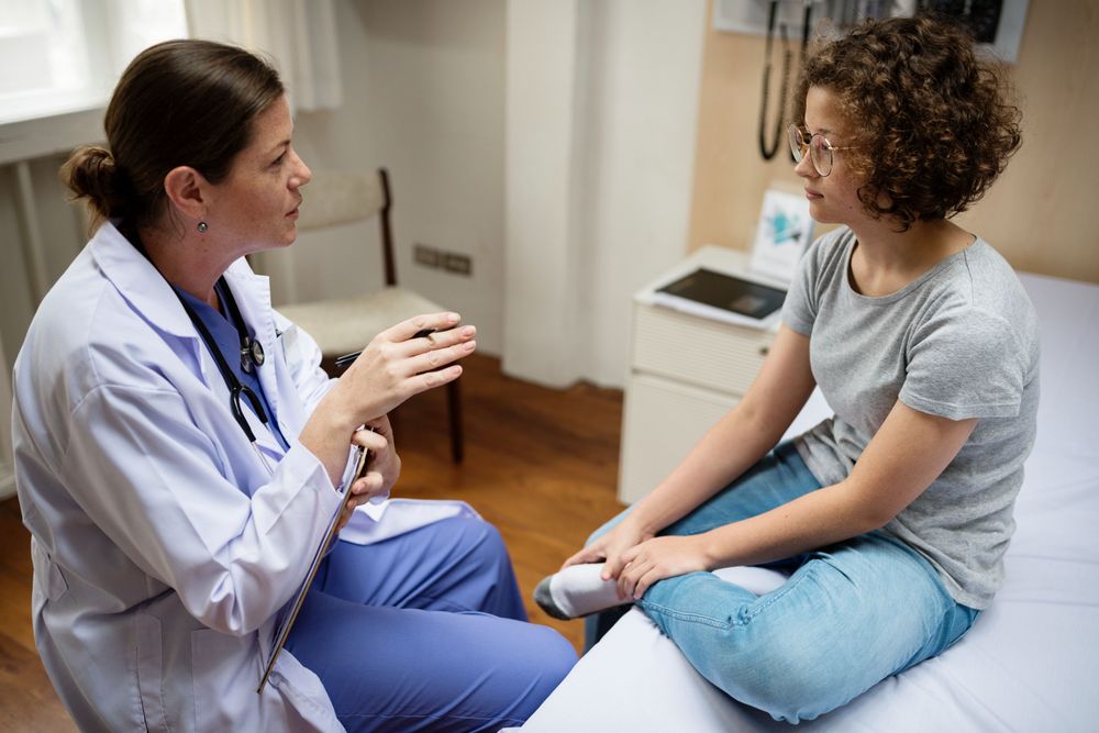 teen with doctor